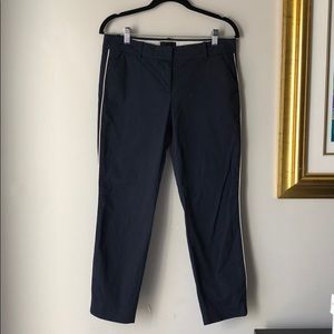 Navy Capris with white piping down the sides.